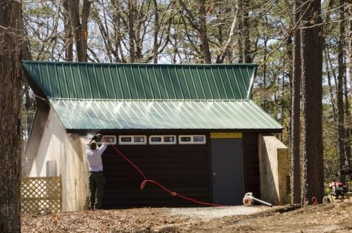 SCPRT crews work on the newly renovated bath and shower house at the cabin area.
