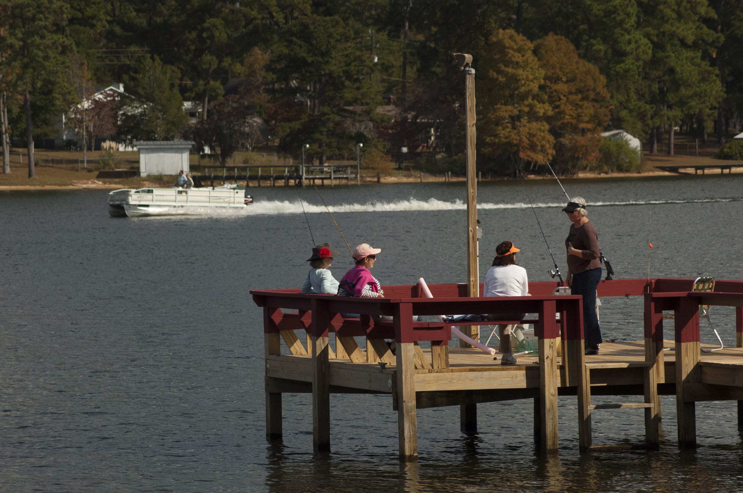 Cruising on the lakes to enjoy the scenic views or just relaxing on the dock of a lakeside cottage are just a few of the activities enjoyed by visitors to Santee Cooper Country. [SCDNR photo by Michael Foster]