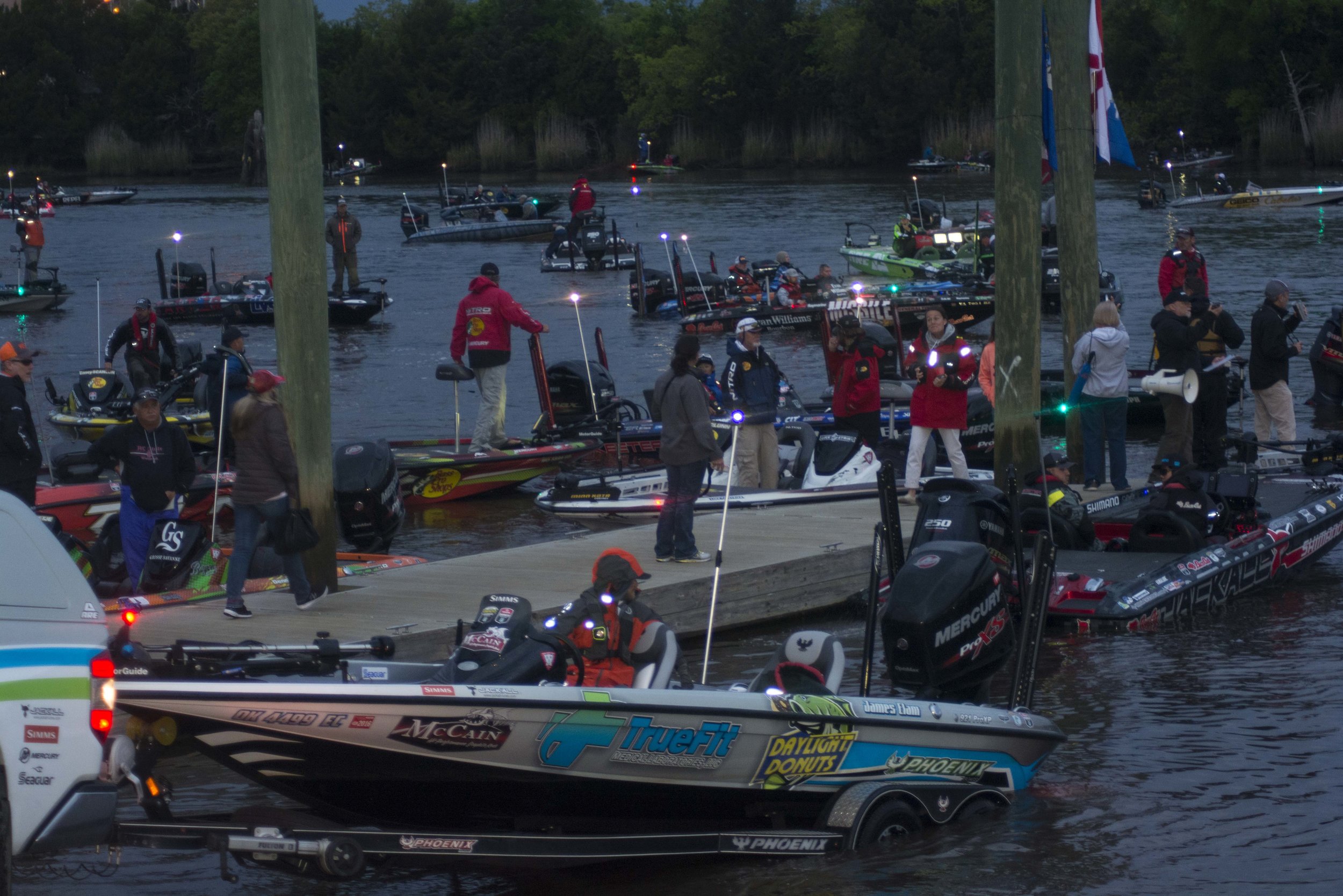 The scene at the early-morning takeoff for a big-time professional bass fishing tournament can resemble controlled chaos, but it's all designed to get the competitors on the water in an organized way and build excitement for the spectators -- part r…