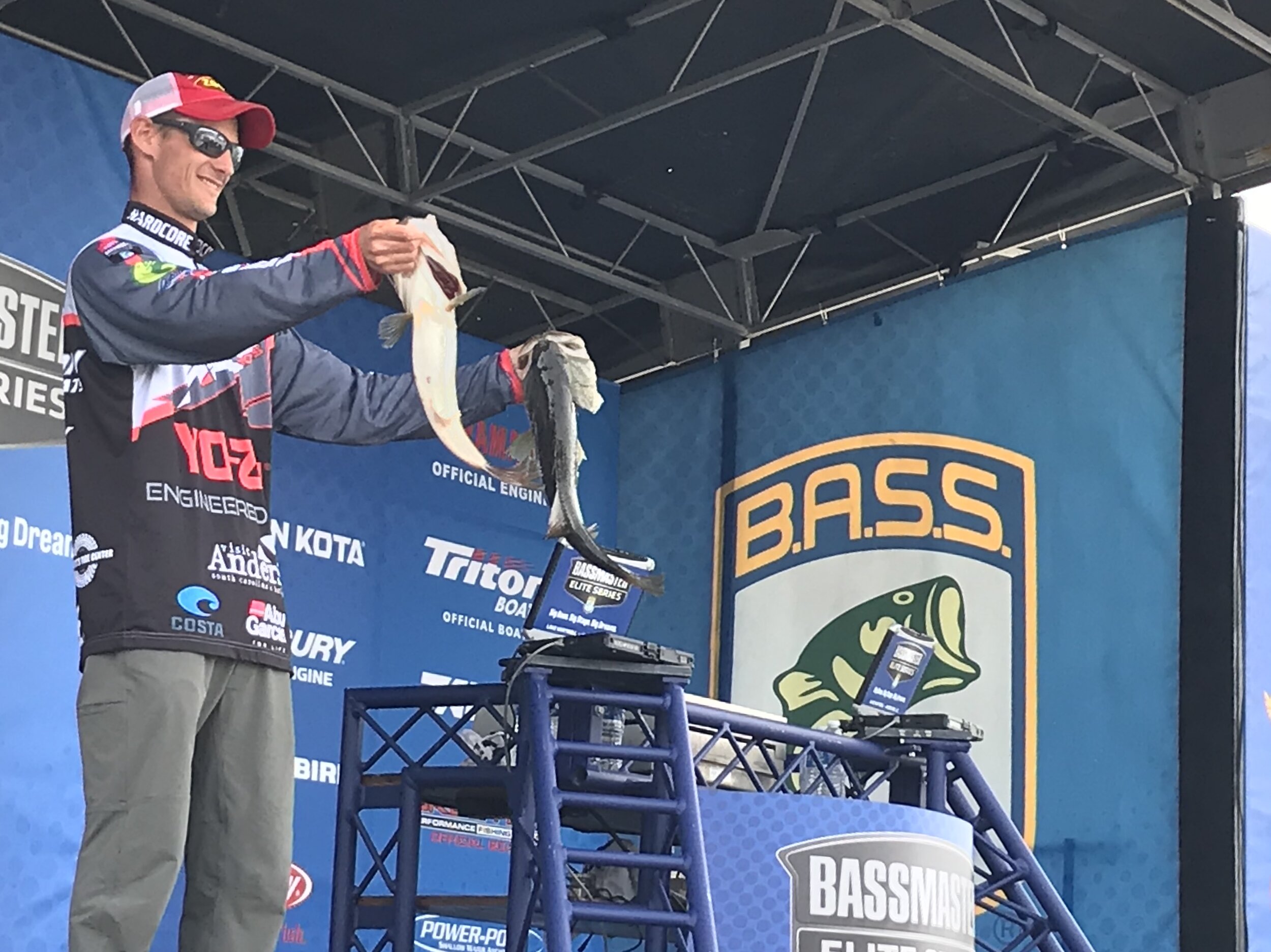 South Carolina-based professional; bass angler Brandon Cobb shows off part of a day’s catch at a “Bassmaster Elite” series tournament at Lake Hartwell. (SCDNR photo by Greg Lucas)