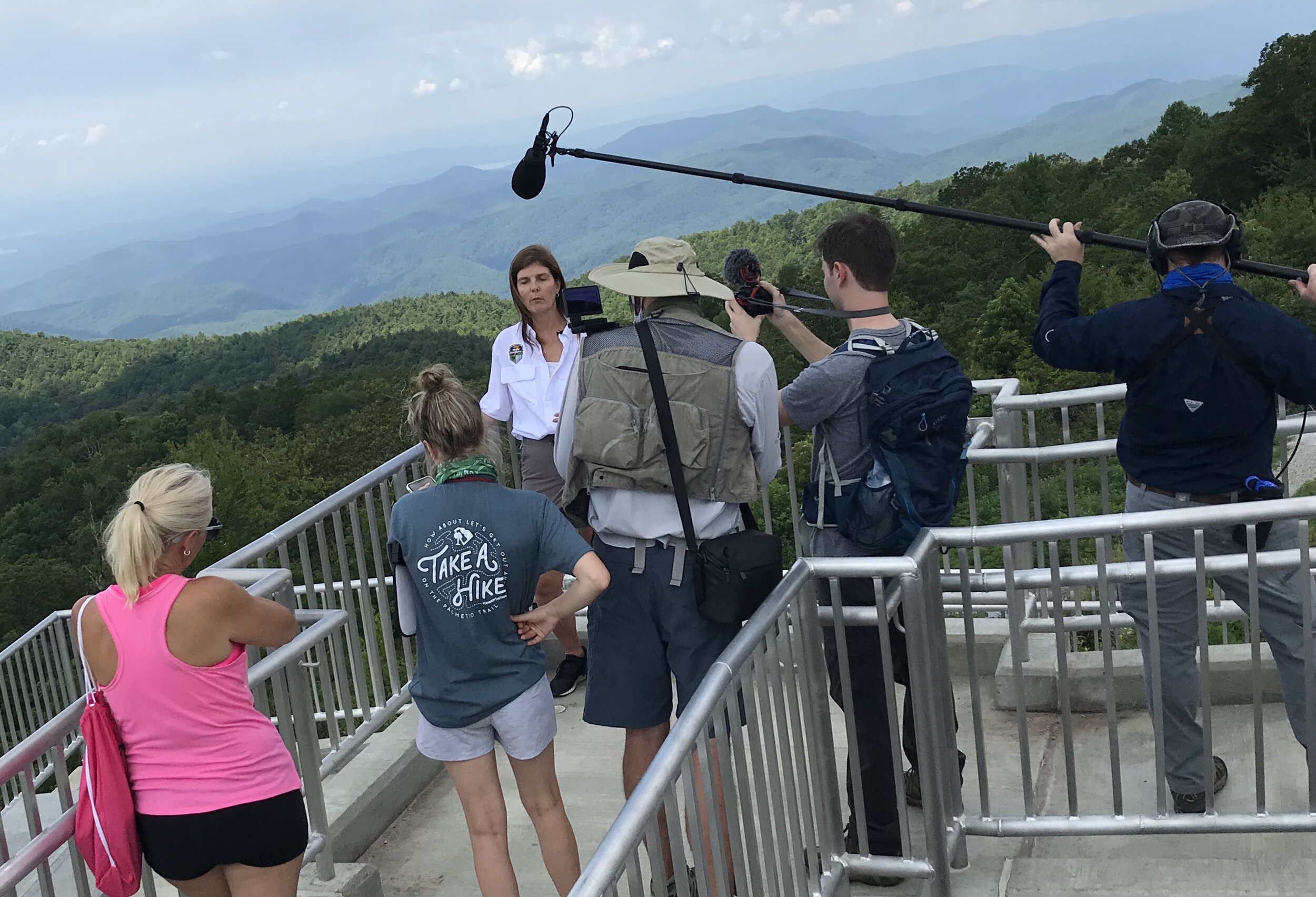 Evette interviewed with mountains in background.jpg