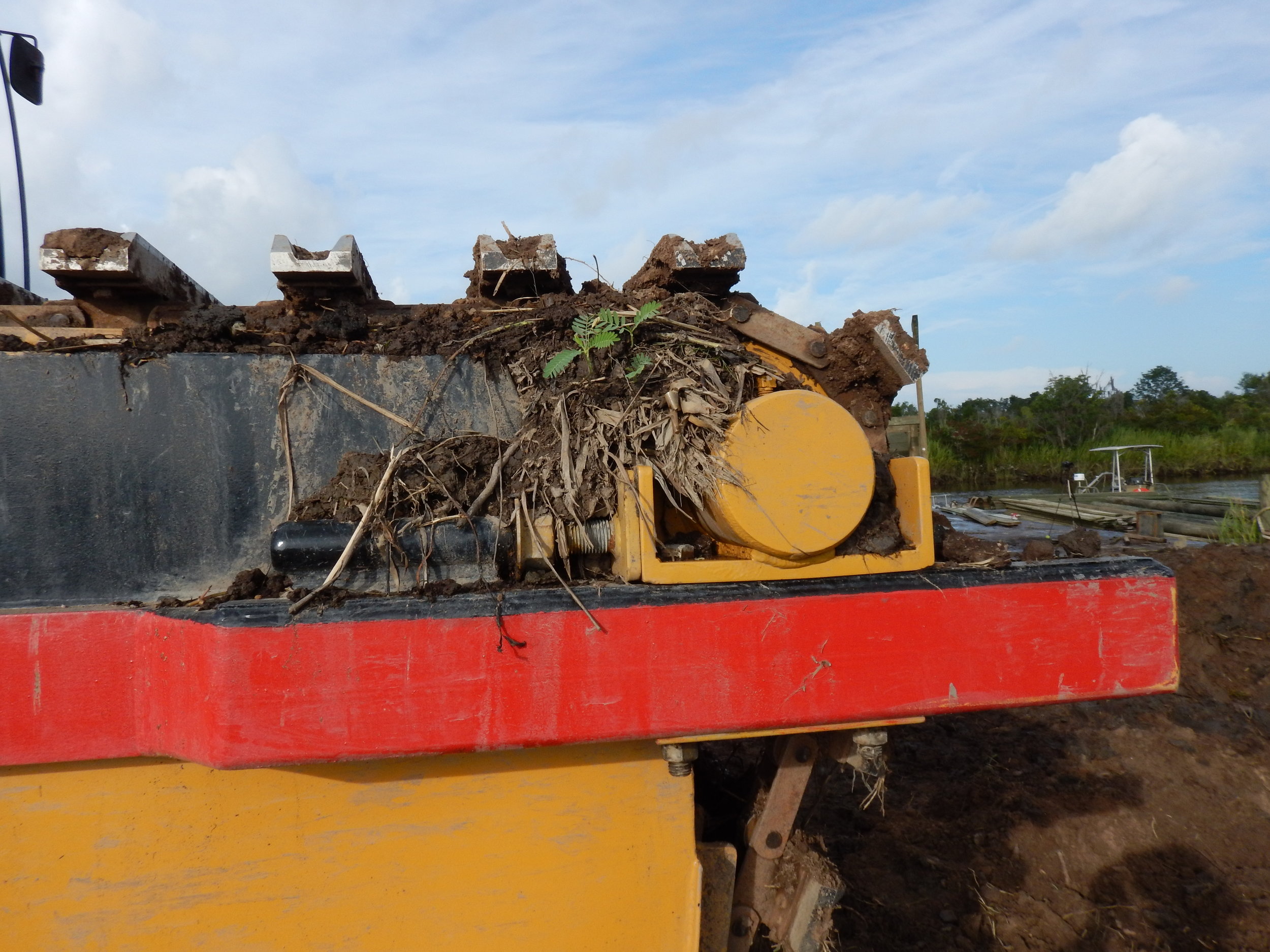 Keeping the Amphib's massive metal tracks adjusted is an ongoing maintenance task that is also the responsibility of the machine's operator.