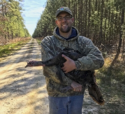 Ryan Klinedinst pauses for a quick photo before releasing a turkey. (photo courtesy Ryan Klinedinst)