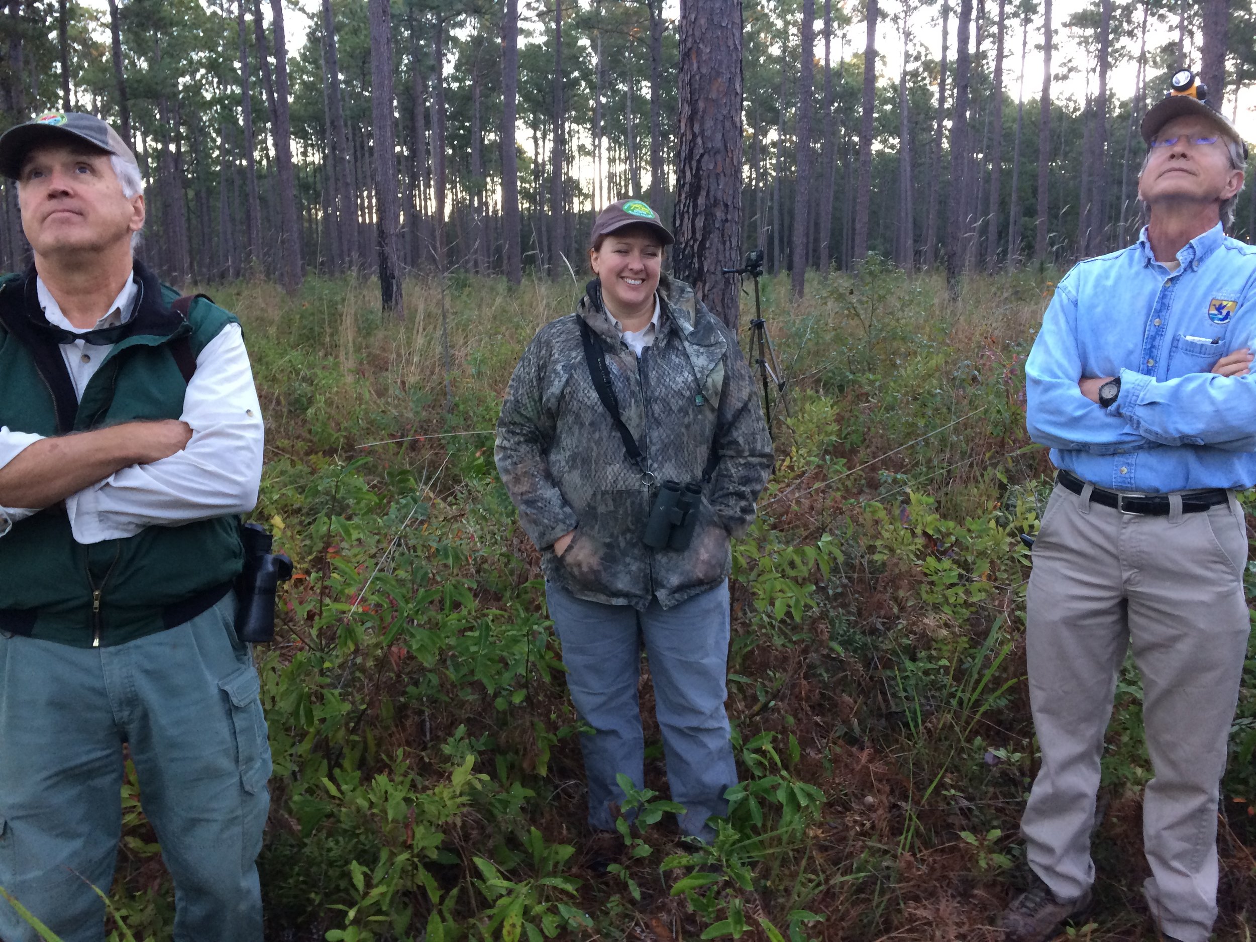 Watching and waiting...Harrigal, Causey and McDearman share a light hearted moment while keeping an eye on the nest cavities and &nbsp;waiting for the ideal moment to release the birds.